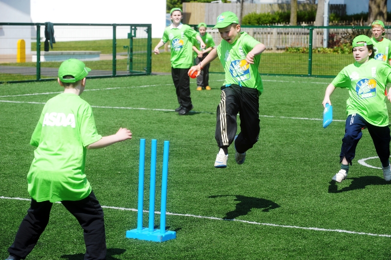 Action at the Asda Kwik Cricket launch at Orangefield Primary